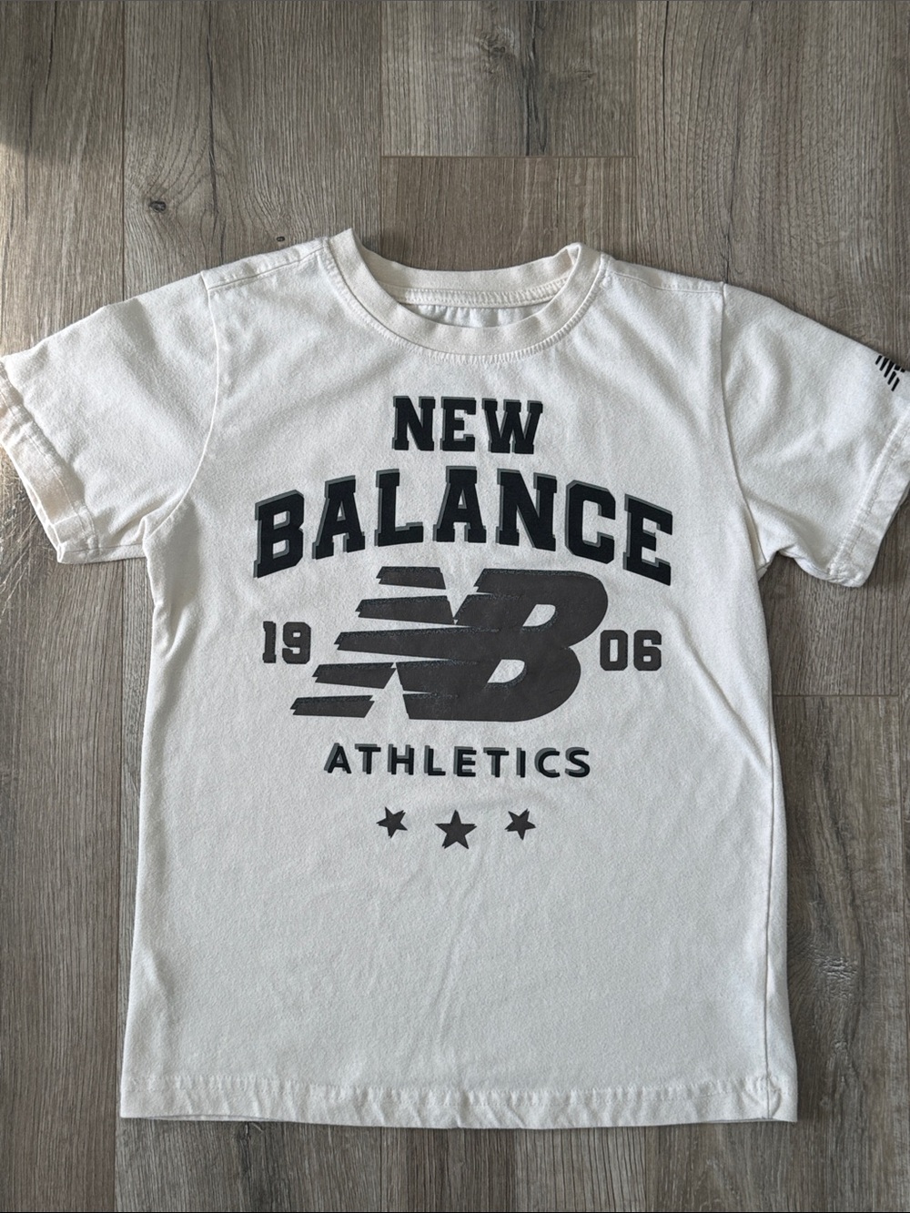 New Balance Boys Ivory/Cream Tee with Brown / Black Athletic Logo Size 12